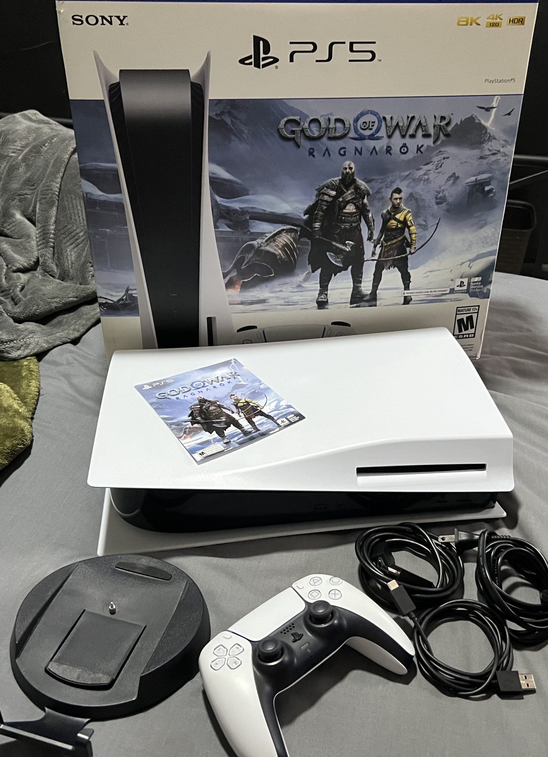 Ps5. Disc addition with God of war game code.